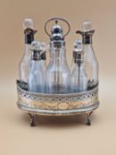 A SILVER CRUET STAND AND EIGHT BOTTLES WITH SILVER MOUNTS, LARGELY LONDON 1813 BUT ONE LONDON 1801