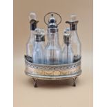 A SILVER CRUET STAND AND EIGHT BOTTLES WITH SILVER MOUNTS, LARGELY LONDON 1813 BUT ONE LONDON 1801