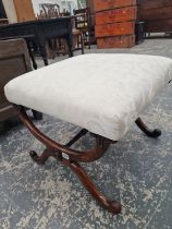A VICTORIAN ROSEWOOD STOOL, THE WHITE DAMASK SEAT ABOVE CURVED X-SHAPED LEGS