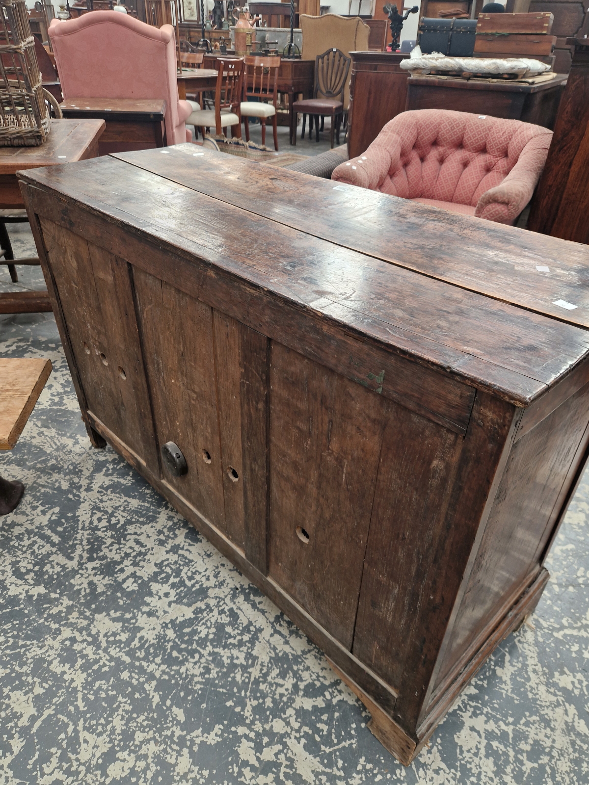 AN 18th C. OAK MULE CHEST LATER CONVERTED WITH A PULL DOWN THREE PANELLED FRONT OVER TWO DRAWERS, - Image 6 of 6