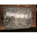 A LARGE SILVER PLATED TRAY IN THE AESTHETIC TASTE.