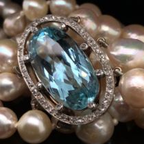 AN ANTIQUE THREE STRAND FRESHWATER PEARL, AQUAMARINE AND DIAMOND NECKLACE. THE THREE FRESHWATER