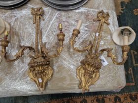 A PAIR OF 19th C. GILT GESSO AND WOOD TWO BRANCH GIRANDOLES, NOW WITH CANDLE LIGHT SOCKETS, THE ARMS