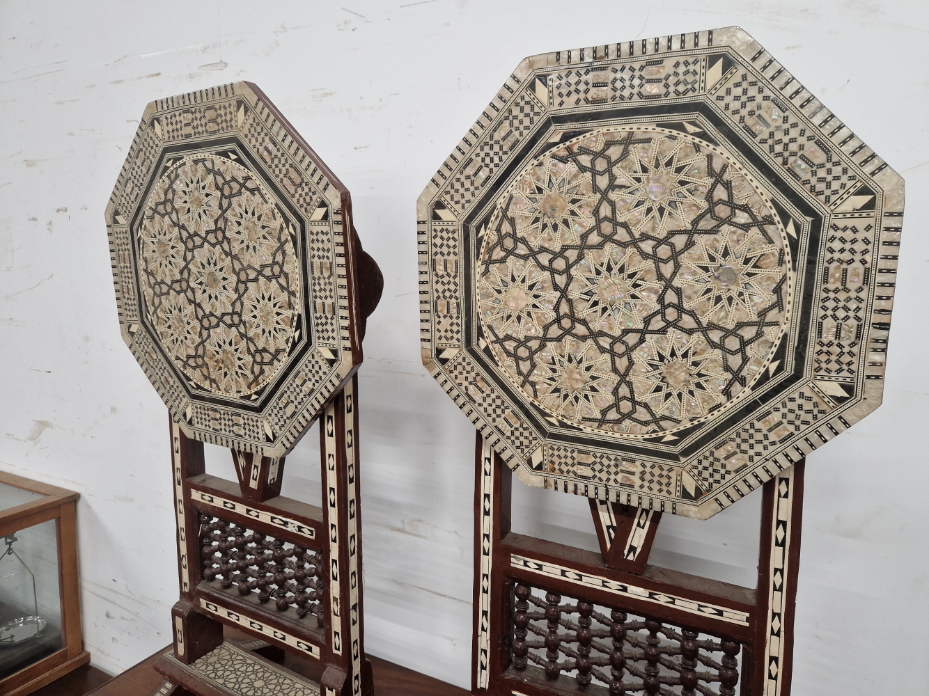A PAIR OF ISLAMIC FOLDING OCTAGONAL TABLES GEOMETRICALLY INLAID IN MOTHER OF PEARL AND EBONY - Image 4 of 13