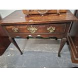 AN 18th C. OAK SIDE TABLE WITH THE RECTANGULAR TOP OVER A SINGLE DRAWER AND CABRIOLE LEGS