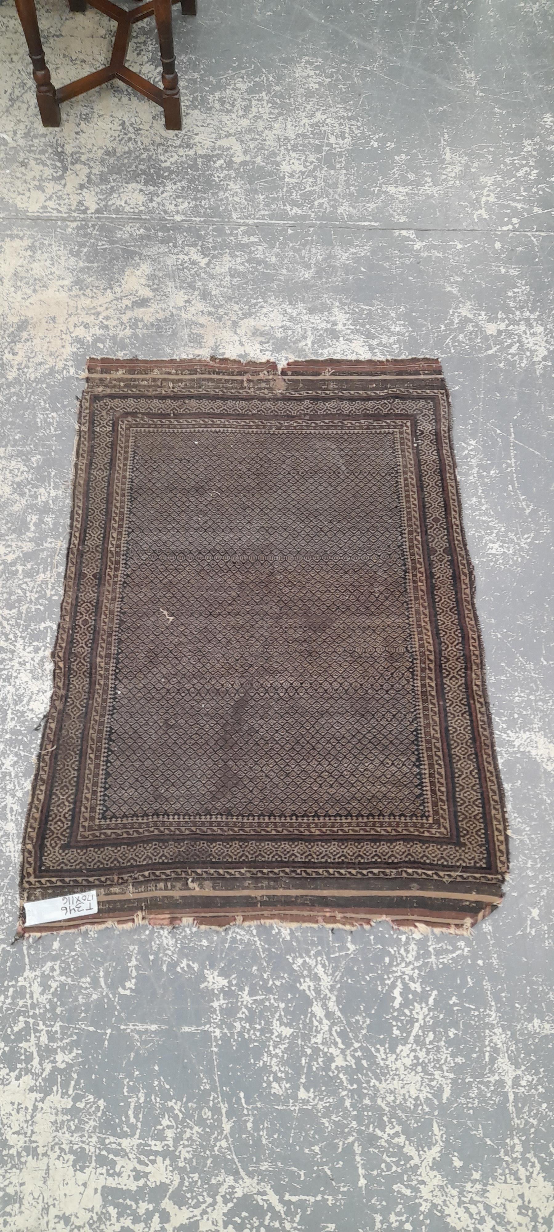 AN ANTIQUE BELOUCH RUG 170 x 116 cm.