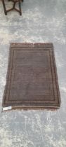 AN ANTIQUE BELOUCH RUG 170 x 116 cm.