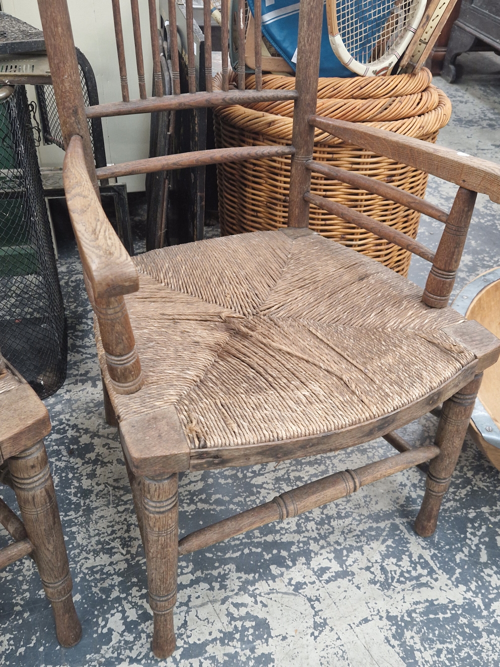 TWO WILLIAM MORRIS STYLE OAK ELBOW CHAIRS WITH RUSH SEATS - Image 3 of 3