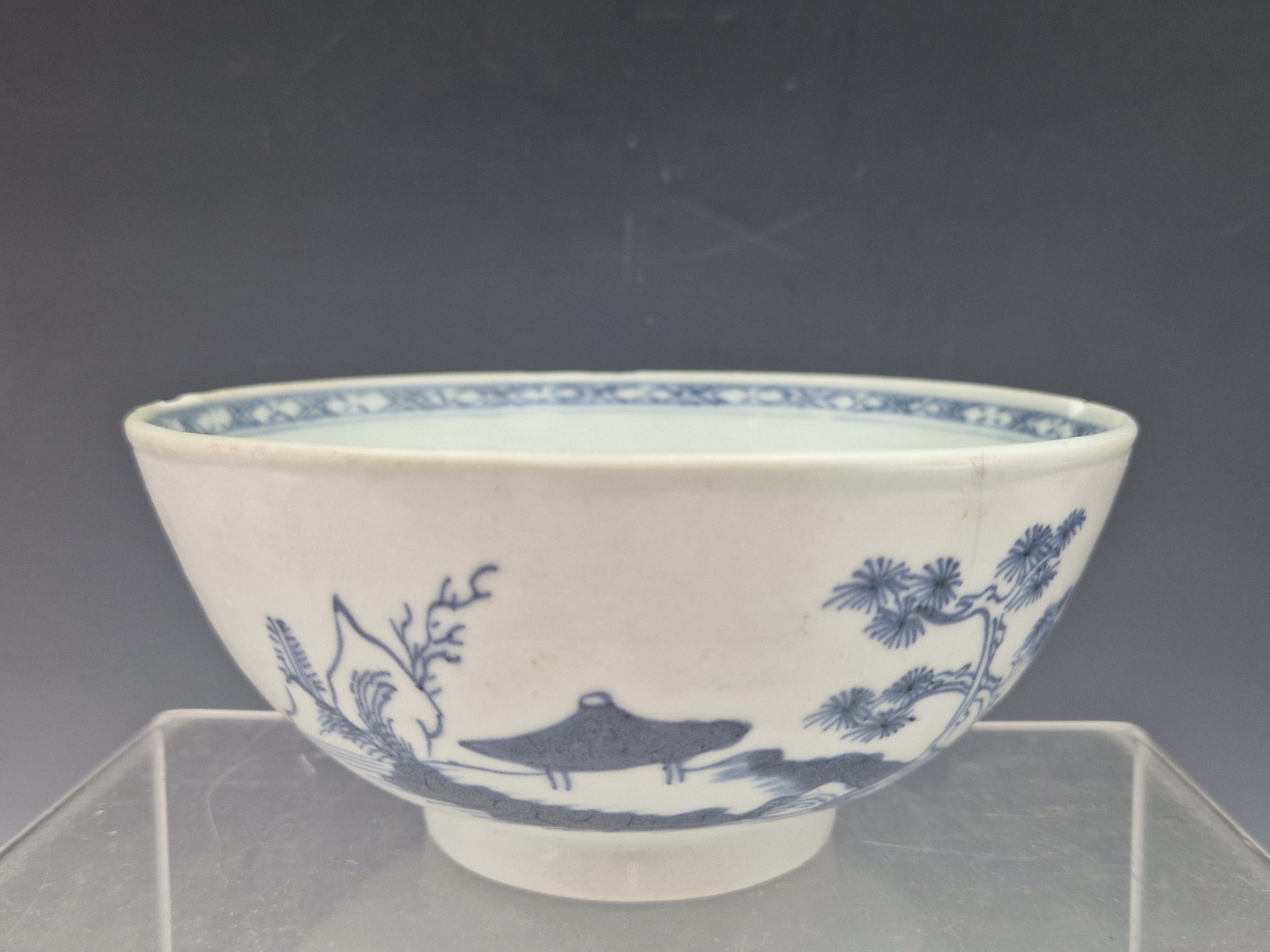 A NANKING CARGO BLUE AND WHITE BOWL, THE EXTERIOR PAINTED WITH ISLANDS, CHRISTIES LABEL FOR LOT