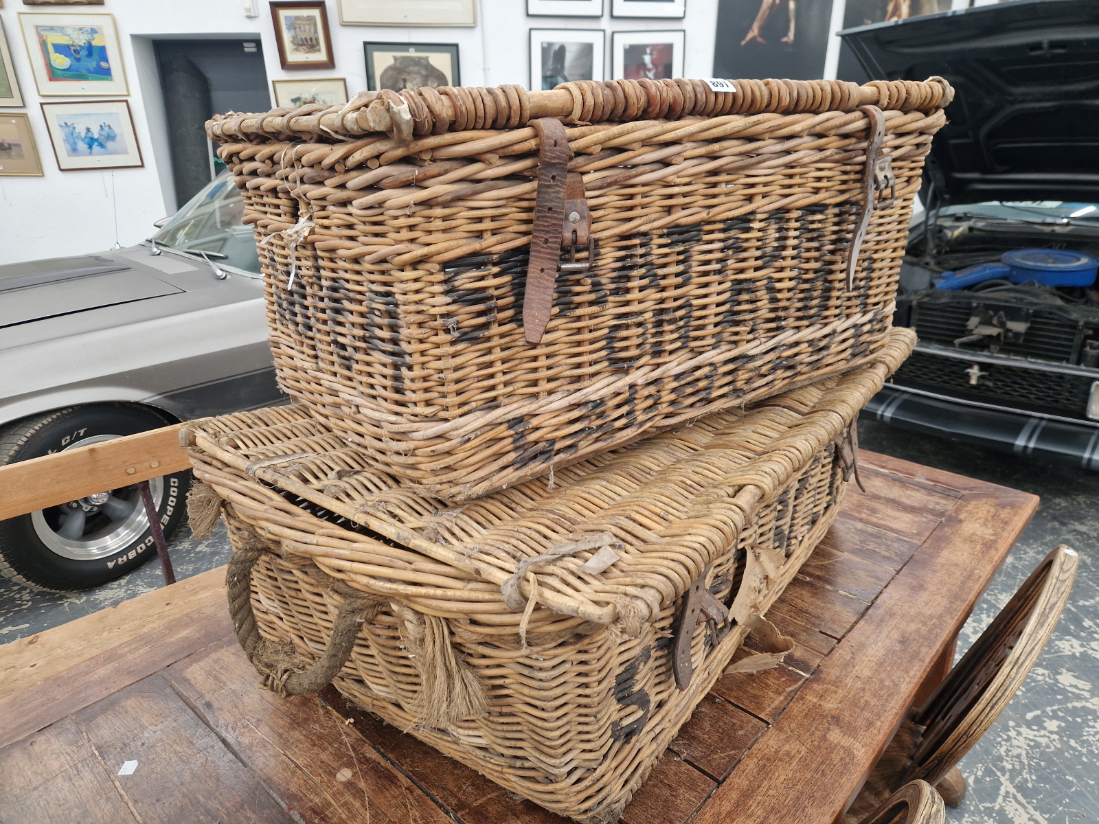 TWO BASKETS INSCRIBED FOR STRATFORD AND FOR OBAN, PROBABLY FOR TRANSPORTING LINEN