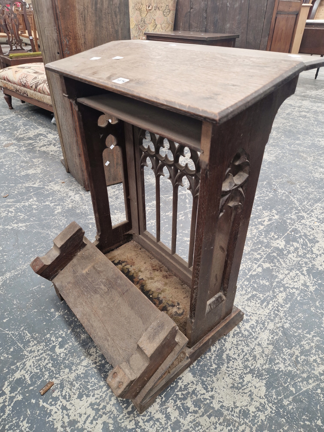 A VICTORIAN GOTHIC REVIVAL PRAYER STAND WITH PIERCED ARCH PANEL FRONT.