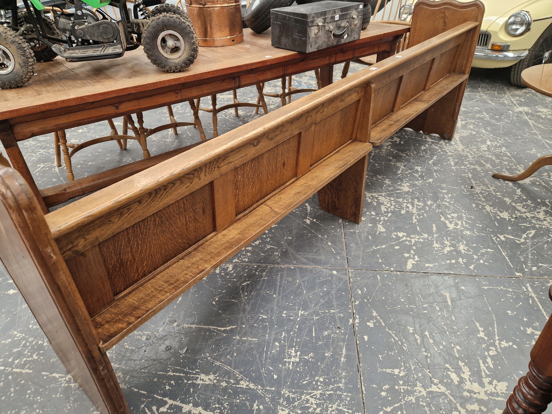 AN OAK PEW WITH PLANK ENDS AND WITH ANOTHER CENTRALLY. W 275cms. - Image 3 of 3