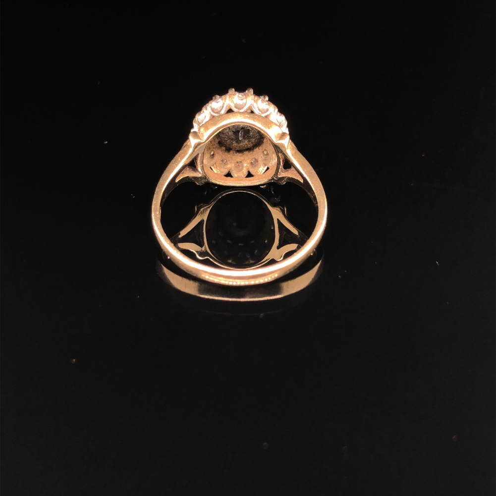 A HALLMARKED 9ct GOLD SAPPHIRE AND DIAMOND CLUSTER RING. FINGER SIZE N. WEIGHT 3.33grms. - Image 2 of 3