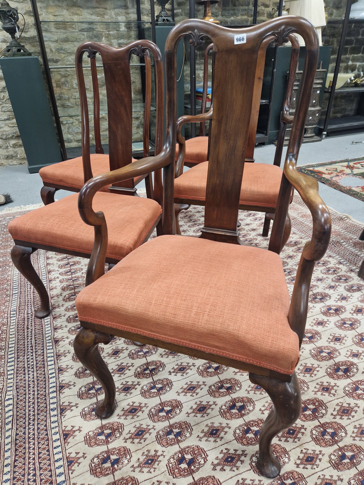 A SET OF SIX QUEEN ANNE STYLE MAHOGANY CHAIRS, TO INCLUDE TWO WITH ARMS, THE STUFFED SEATS ABOVE