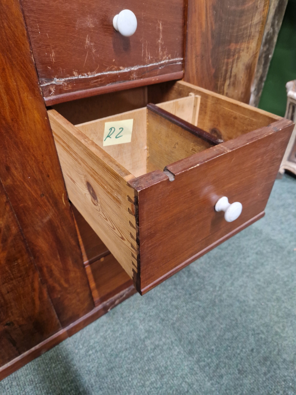 A MAHOGANY SHOP COUNTER FITTED WITH MULTIPLE DRAWERS AND CUPBOARDS EACH WITH WHITE CERAMIC KNOB - Image 17 of 23