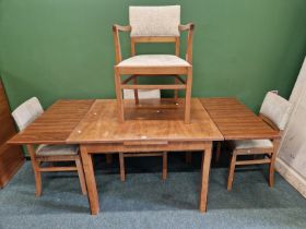 AN ART DECO WALNUT DINING SUITE, TABLE SIX CHAIRS, AND SIDEBOARD.