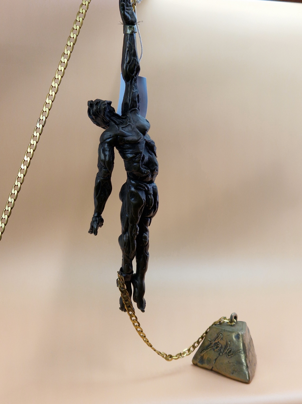 FELIPE GONZALEZ, A CONTEMPORARY BRONZE FIGURE OF A NAKED DIVER, A MANACLE ON HIS LEFT WRIST