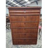 A 19th C . EUROPEAN MAHOGANY CHEST WITH A SHAPED DRAWER ABOVE FIVE OTHERS. W 106 x D 56 x H 139cms.