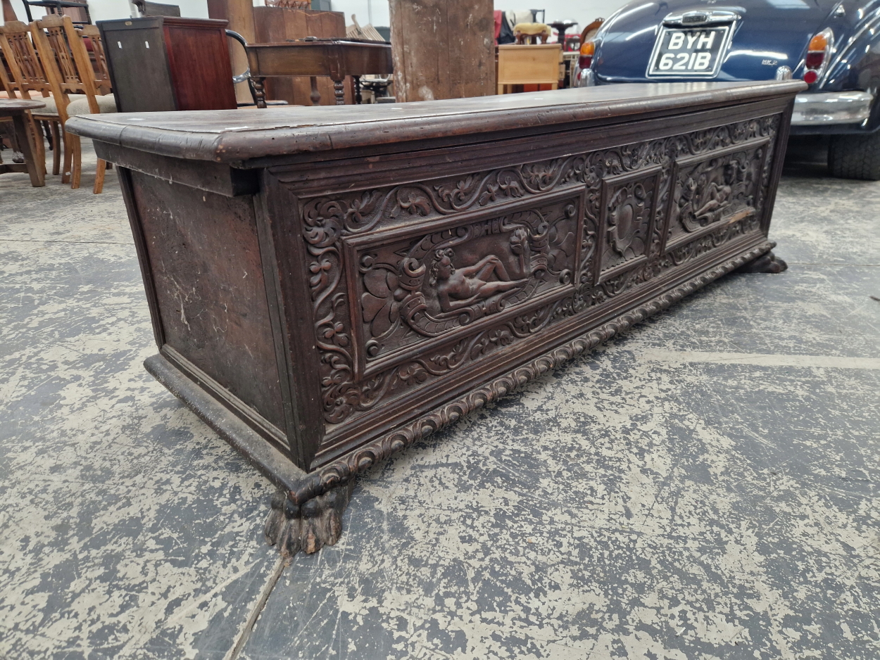 A LARGE WALNUT CARVED FRONT CASSONNE /COFFER . WITH CARVED PAW FEET. - Image 2 of 6