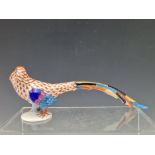 A HEREND MODEL OF A GOLDEN PHEASANT. W 22cms.