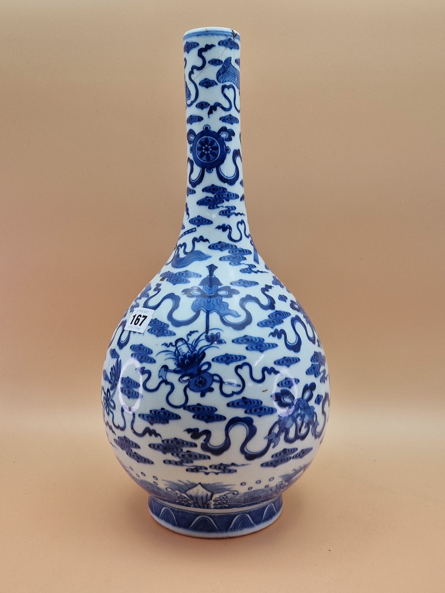 A CHINESE BLUE AND WHITE BOTTLE VASE PAINTED WITH RIBBON TIED PRECIOUS OBJECTS AMONGST CLOUDS. H - Image 4 of 18