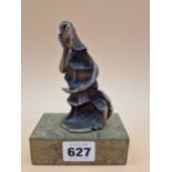 FELIPE GONZALEZ, A CONTEMPORARY BRONZE FIGURE OF A LADY GESTURING WITH ONE HAND TO HER HEAD AS SHE