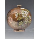 A DOULTON COMPRESSED SPHERICAL VASE PAINTED WITH WHITE AND YELLOW BLOSSOMS FLOWERING ON A STREAKY