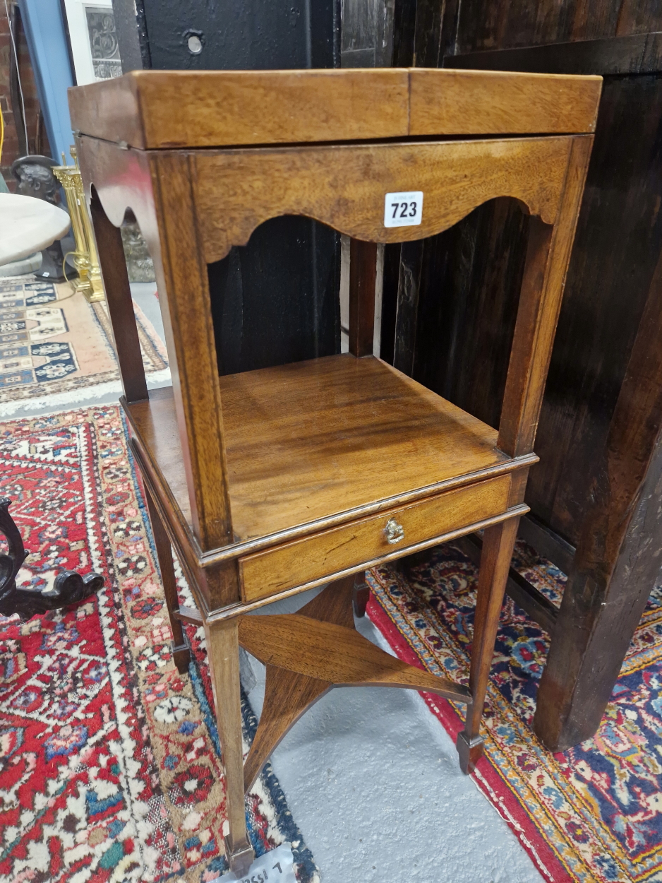 A GEORGE III LINE INLAID MAHOGANY WASH STAND, THE CENTRALLY SPLIT TOP OPENING ONTO BOWL RECEIVERS