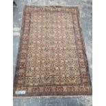 A FINELY WOVEN PERSIAN RUG OF UNUSUAL DESIGN 200 x 136 cm
