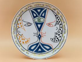 A ROSENTHAL JEAN COCTEAU PLATE, A PORCELAIN JUG WITH A CAT HANDLE, A WEDGWOOD AND A MINTON TEA POT.