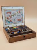 A LATE VICTORIAN ROWNEY MAHOGANY PAINT BOX CONTAINING UNUSED BLOCKS OF PAINT, A PALETTE AND A