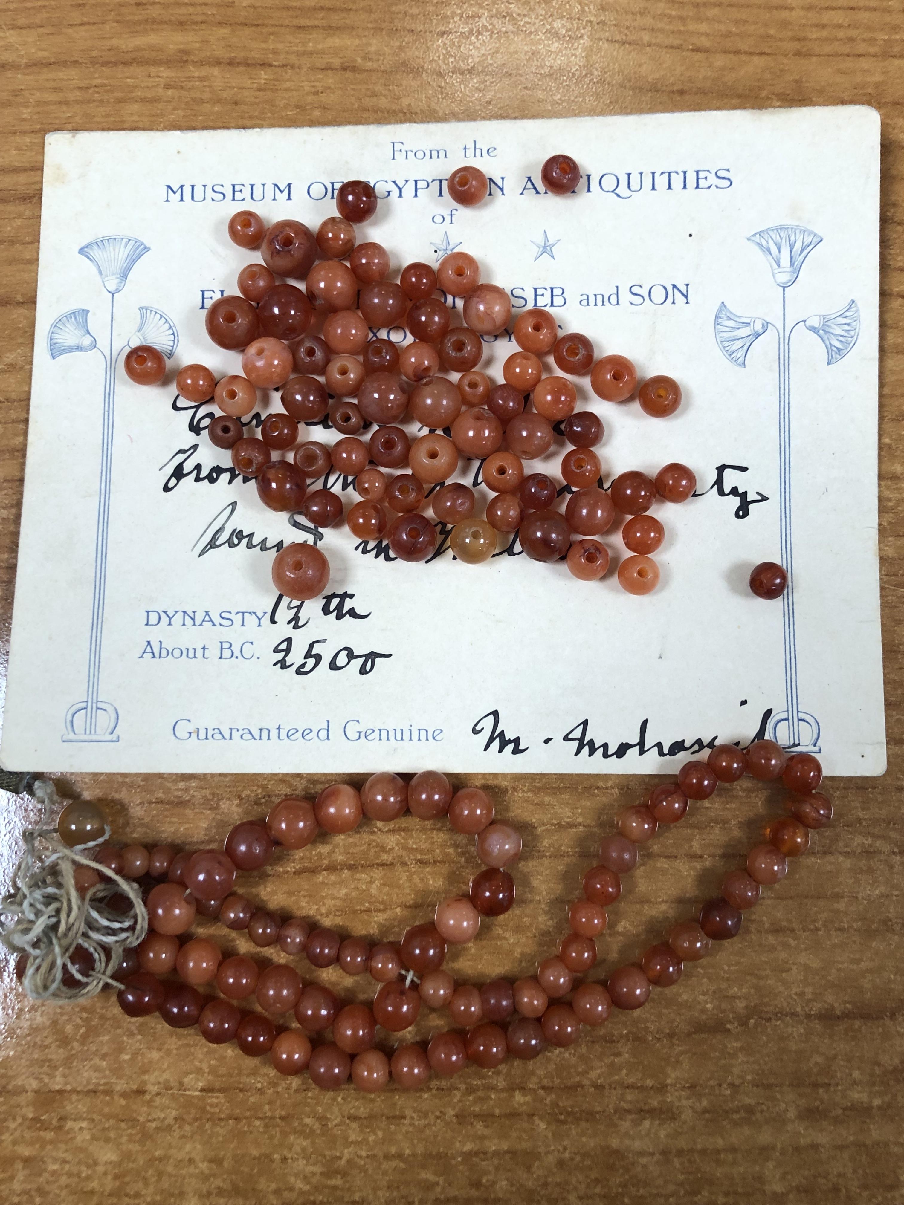 A COLLECTION OF EGYPTIAN CORNELIAN SPHERICAL BEADS - Image 5 of 7