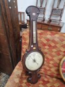 A ROSEWOOD BANJO BAROMETER LABELLED FOR MINORETTI OF LEICESTER WITH AN ALCOHOL THERMOMETER ABOVE THE