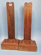 TWO WEIGHTED MAHOGANY CHARGER STANDS, A SERPENTINE COLUMNAR STAND, A PAIR OF PINK MARBLE STANDS
