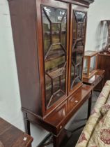 A 19th C. GLAZED MAHOGANY DISPLAY CASE NOW ON A TABLE BASE WITH TAPERING SQUARE SECTIONED LEGS