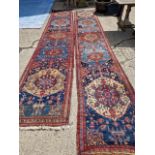 A NEAR PAIR OF PERSIAN TRIBAL COUNTRY HOUSE RUNNERS 530 x 94 cm AND 515 x 101 (2)