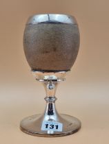 A SILVER MOUNTED EMU EGG GOBLET BY J H HILCOX, BIRMINGHAM 1904. H 18cms.