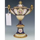 A CROWN DERBY BLUE GROUND TWO HANDLED OVAL URN AND COVER, DATE LETTER FOR 1904, PAINTED WITH GOLD