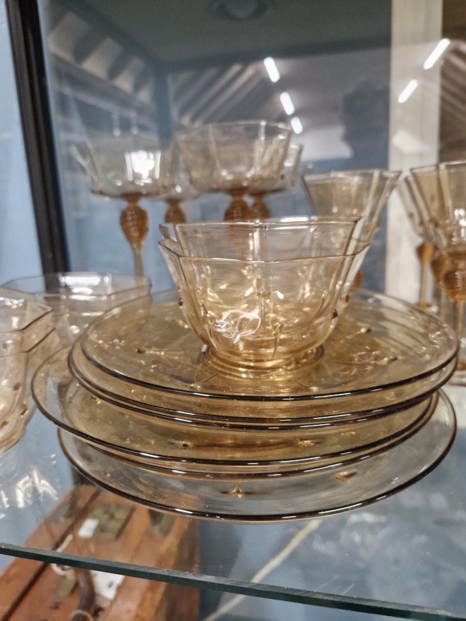 ATTRIBUTED TO SALVIATI, A PALE AMBER GLASS PART DRINKING SET, THE BASES OF THE OCTAGONAL BOWLS - Image 4 of 6