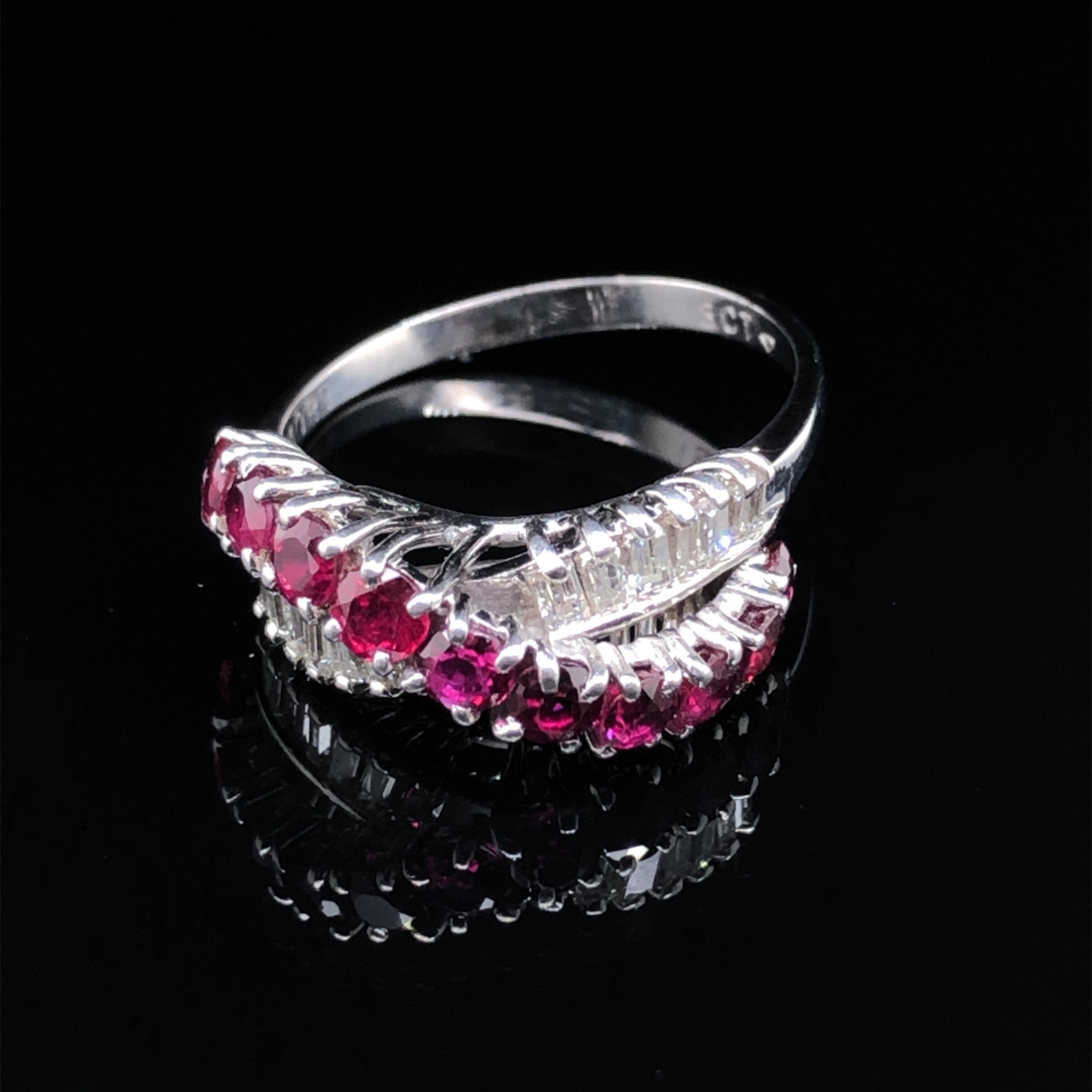 A MID 20th CENTURY RUBY AND DIAMOND RING. THE RING DESIGNED AS CROSS OVER RING, WITH A RAISED RUBY - Image 10 of 10