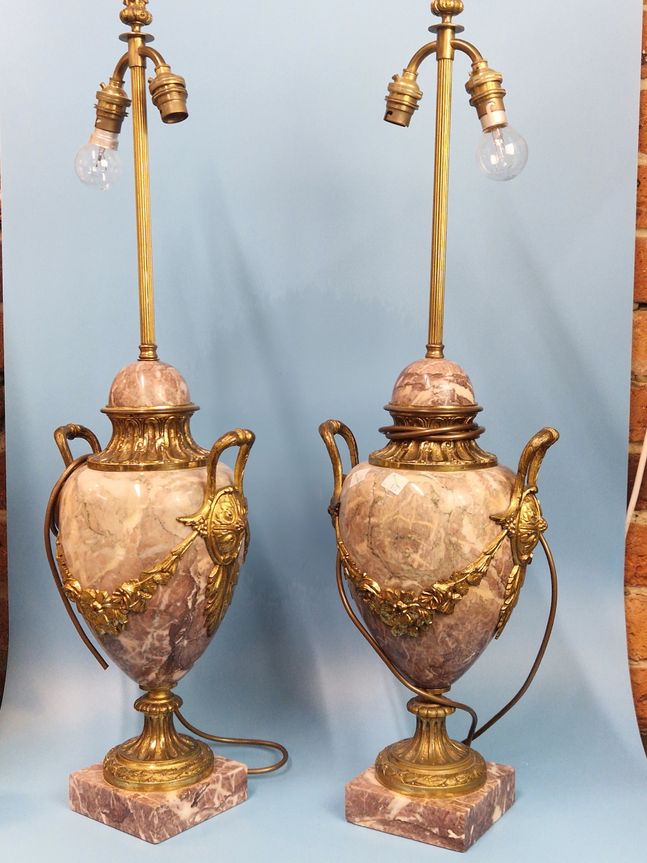 A PAIR OF ORMOLU MOUNTED MOTTLED PINK MARBLE TWO HANDLED BALUSTER LAMPS, EACH WITH TWO SOCKETS AND - Image 2 of 4