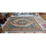 A TURKISH COUNTRY HOUSE CARPET OF TRIBAL DESIGN 458 x 407 cm