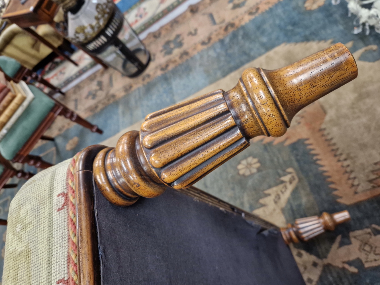 A LATE VICTORIAN STYLE MAHOGANY OTTOMAN, THE SQUARE FLORAL NEEDLE WORKED SEAT ON REEDED CYLINDRICAL - Image 5 of 6