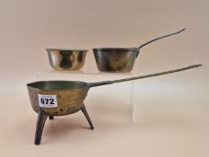 AN 18th C. BRASS TRIPOD SKILLET, A LATER BRASS SAUCEPAN TOGETHER WITH A BRASS BOWL. Dia. 10cms.
