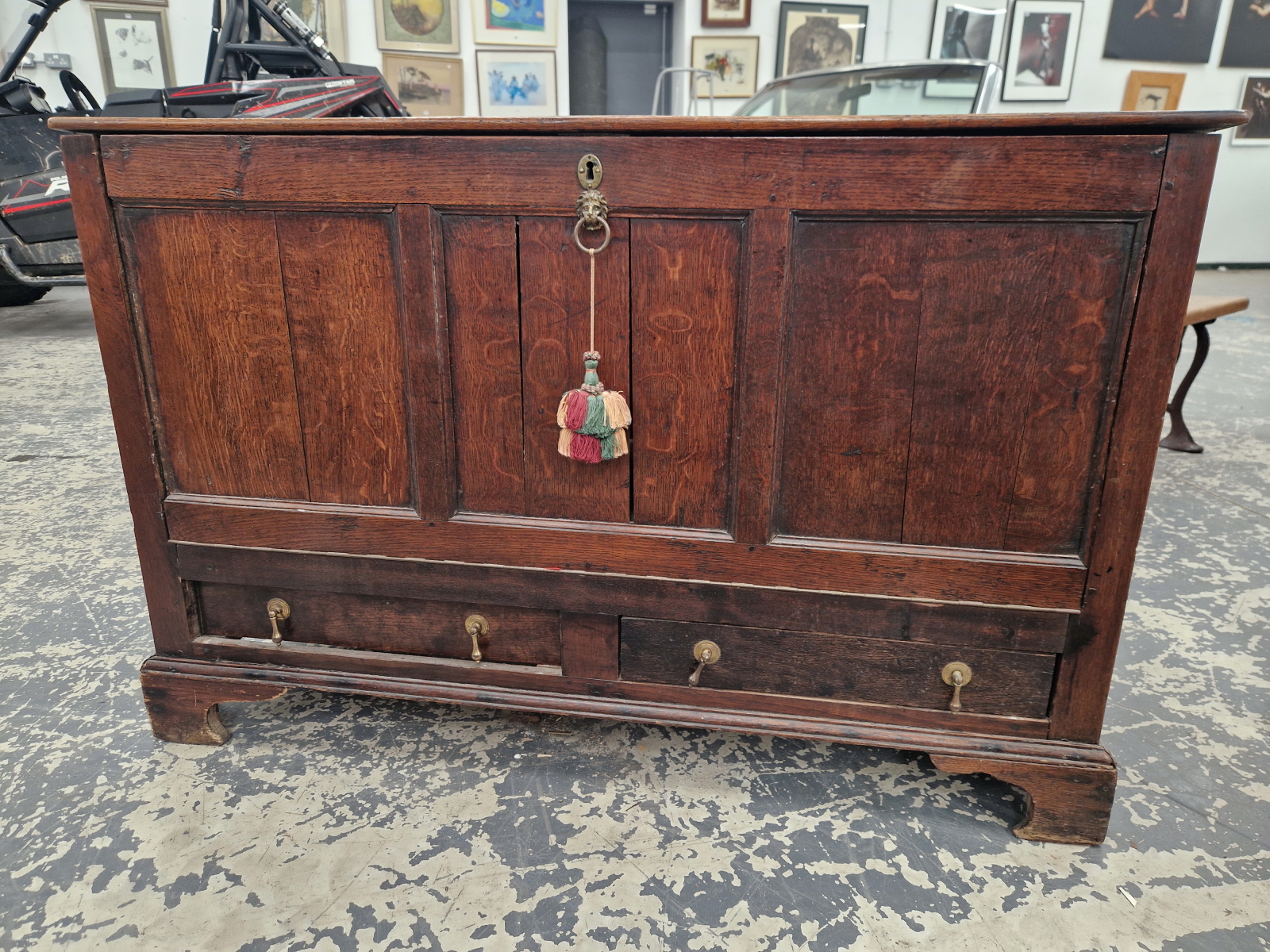 AN 18th C. OAK MULE CHEST LATER CONVERTED WITH A PULL DOWN THREE PANELLED FRONT OVER TWO DRAWERS, - Image 2 of 6