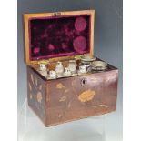 A FLORAL MARQUETRIED MAHOGANY PHARMACY CHEST CONTAINING EIGHT BOTTLES, THE BOX. W 18cms.
