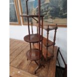 A MAHOGANY THREE TIER FOLDING CAKE STAND, A TOWEL RAIL AND A THREE SHELF WALL UNIT