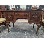 A MAHOGANY THREE DRAWER LOW BOY WITH SQUARES OF BURR WOOD VENEERS TO THE TOP, THE CABRIOLE LEGS ON