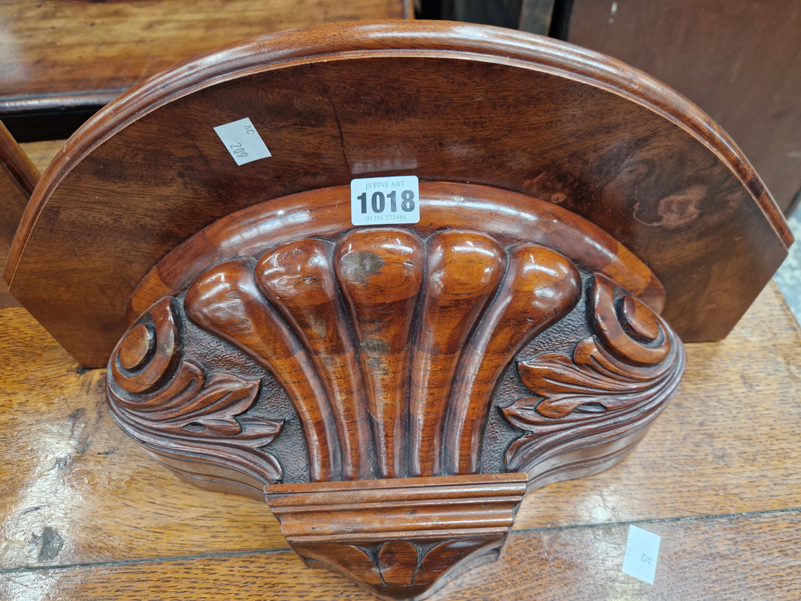 TWO LATE VICTORIAN MAHOGANY WALL SHELVES, ONE RECTANGULAR AND THE OTHER HALF ROUND