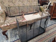 A VICTORIAN NURSERY FENDER AND THREE FURTHER FIRE FENDERS TOGETHER WITH A FOLDING FIRE SCREEN (5)